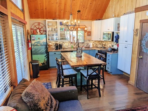 We have a large center island which also serves as seating for 7. In the summertime we have dining seating setup outside on our deck as well.