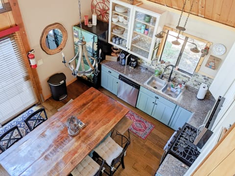 Overhead view, looking over the loft of our full kitchen and dining area. We hope that you will love Lake Tahoe as much as we do!