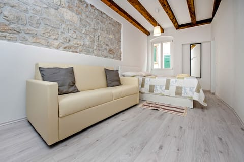 Basic Apartment | Living area | Flat-screen TV