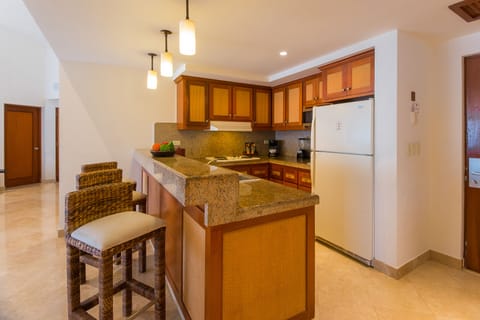 Two Bedroom Presidential Suite  | Private kitchen | Full-size fridge, microwave, stovetop, coffee/tea maker