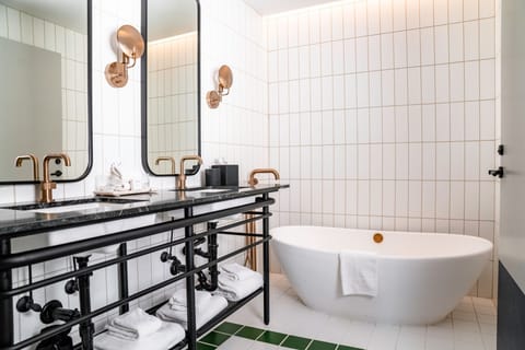 Suite, 1 King Bed (Woodlark Suite) | Bathroom | Shower, designer toiletries, hair dryer, bathrobes