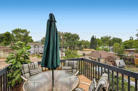 Main level deck with view of Pikes Peak seats up to 6 people.