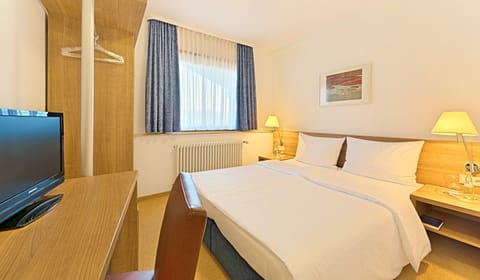 Economy Double Room | Premium bedding, in-room safe, desk, iron/ironing board