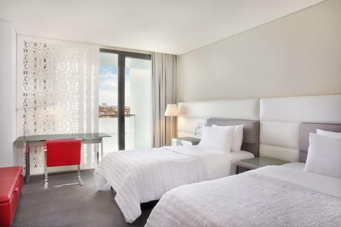 Deluxe Room, 2 Twin Beds, City View (Balcony) | Minibar, in-room safe, desk, rollaway beds