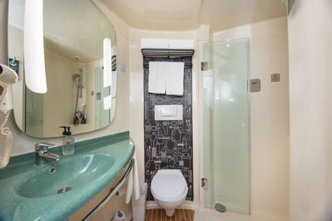 Shower, eco-friendly toiletries, hair dryer, towels