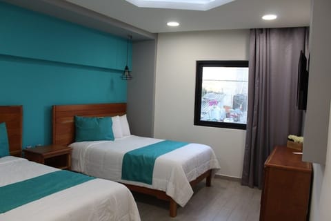 Standard Quadruple Room, 2 Double Beds, Non Smoking | Desk, blackout drapes, bed sheets