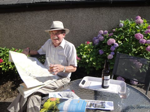 Enjoying the sunshine [and the wine] in the back garden