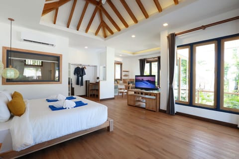 Villa, Beachfront | Minibar, in-room safe, individually decorated, individually furnished