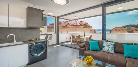 Luxury Penthouse | Living area | Flat-screen TV