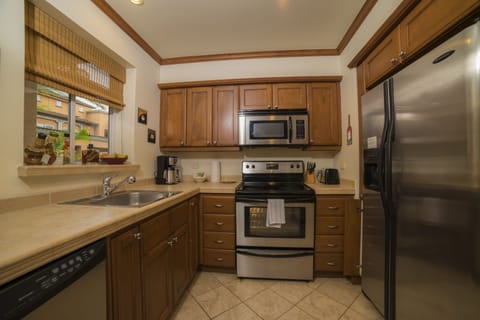 Condo, 1 King Bed (Los Suenos Resort Veranda 5E) | Private kitchen | Full-size fridge, microwave, oven, stovetop