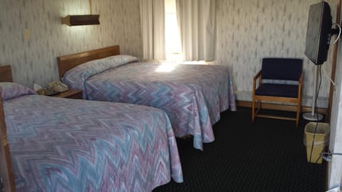 Basic Double Room | Blackout drapes, iron/ironing board, free WiFi, bed sheets