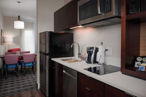 Studio, 2 Queen Beds | Private kitchen | Full-size fridge, microwave, stovetop, dishwasher