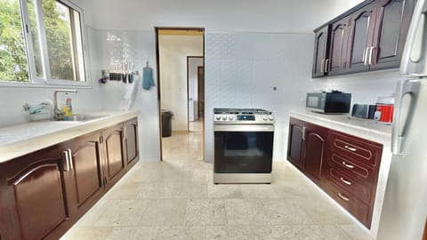 Luxury Apartment, Multiple Beds | Private kitchen | Full-size fridge, microwave, oven, stovetop