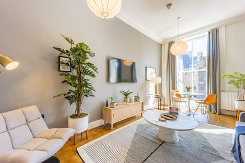 1 Bedroom Apartment | Living area | Smart TV