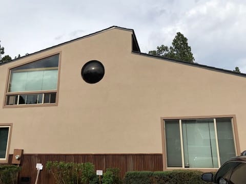 Side view from parking lot. Free standing, no attached walls to other uni