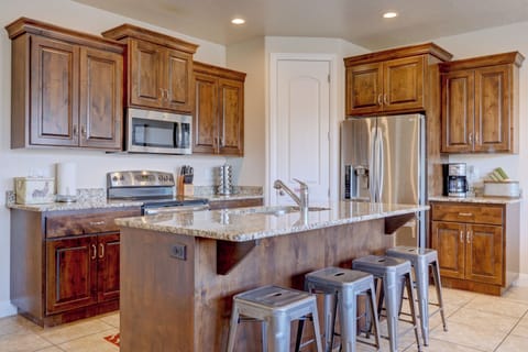 Beautiful granite counter tops with stainless appliances and large island