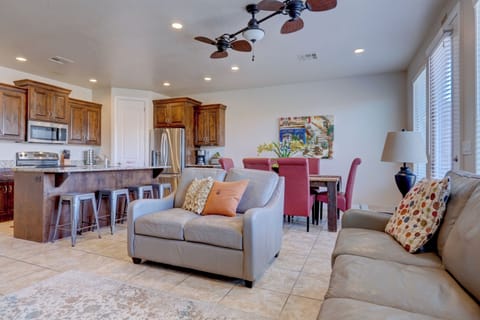 Large open concept kitchen and living area with access to private back patio