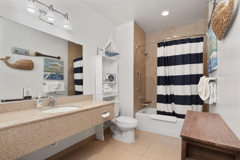 204 - Whales Inn | Bathroom | Combined shower/tub, designer toiletries, hair dryer, towels