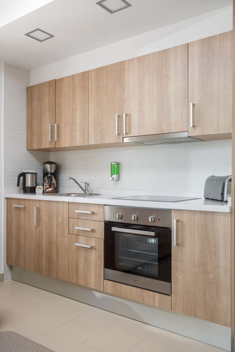 Apartment, 1 Bedroom | Private kitchen | Full-size fridge, microwave, oven, dishwasher