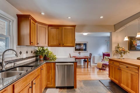 Enjoy the open layout and renovated kitchen with a beautiful cherry wood island.