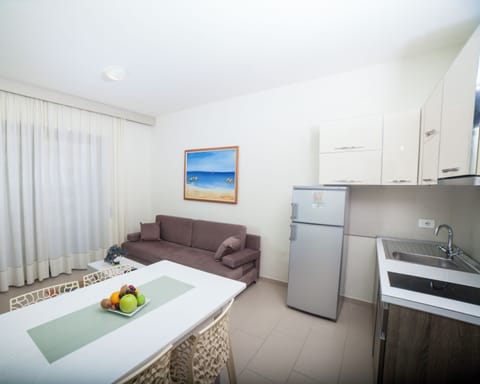 Family Double Room, Mountain View | Living room | 32-inch flat-screen TV with satellite channels, TV