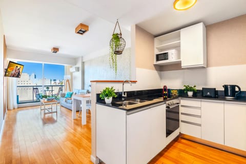 Deluxe Apartment, 1 Bedroom | Private kitchen | Full-size fridge, microwave, oven, stovetop