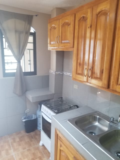 Basic Single Room, 1 Queen Bed, Non Smoking | Private kitchen | Fridge, oven, stovetop