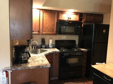 Family Cottage, Multiple Beds, Non Smoking, Fireplace | Private kitchen | Microwave, coffee/tea maker, toaster, cleaning supplies
