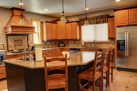 Knotty Alder Cabinets with slab countertops--2 dishwashers & 2 refrigerators!