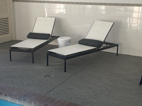 Indoor pool, sun loungers