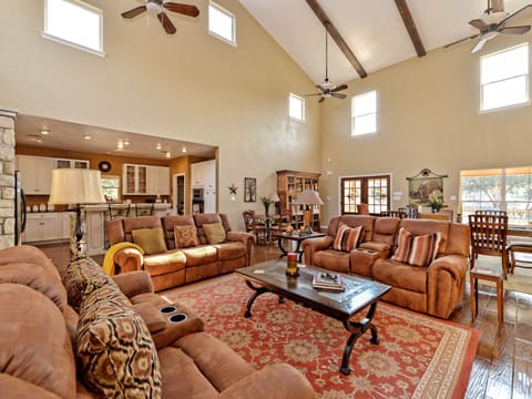 Another view of living room, looking towards kitchen and dining area.
