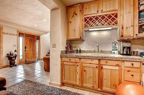 Downstairs wet bar in living area.
