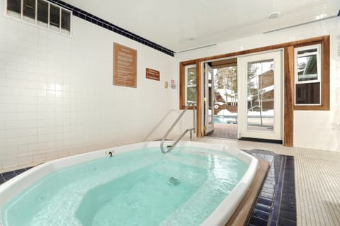 Relax an unwind in the indoor jetted hot tub.
