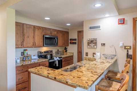 Full-size kitchen with a breakfast bar.