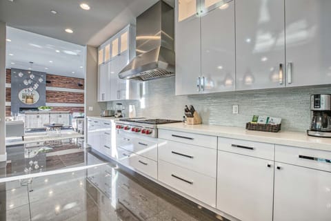 Plenty of counter space in this modern kitchen w/ large gas range & cooktop