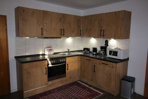 Comfort Apartment, 2 Bedrooms | Private kitchen | Fridge, microwave, stovetop, dishwasher