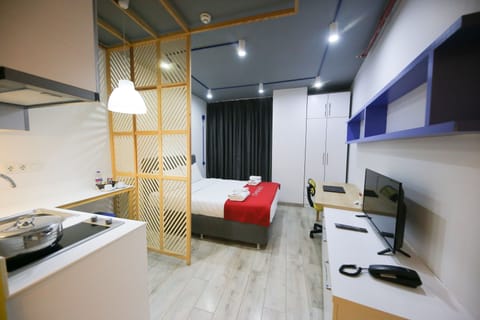 Grand Studio | Premium bedding, blackout drapes, iron/ironing board, free WiFi