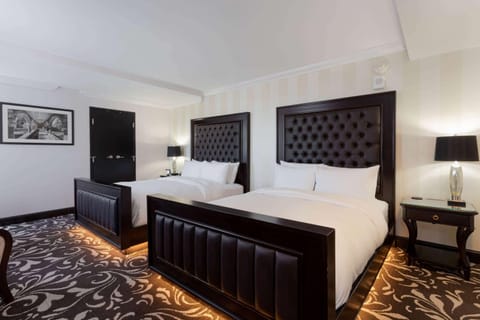 Deluxe Room, 2 Queen Beds, Non Smoking | Egyptian cotton sheets, premium bedding, pillowtop beds, in-room safe