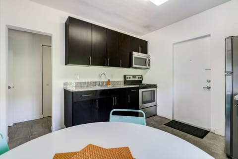 Standard Studio, 1 Queen Bed, Non Smoking (Corner) | Private kitchen | Full-size fridge, microwave, oven, stovetop