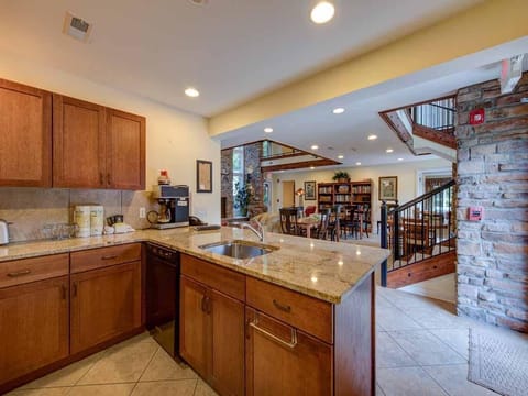 Kitchen/Dining . Granite counter tops and fully stocked. Another refr in dining