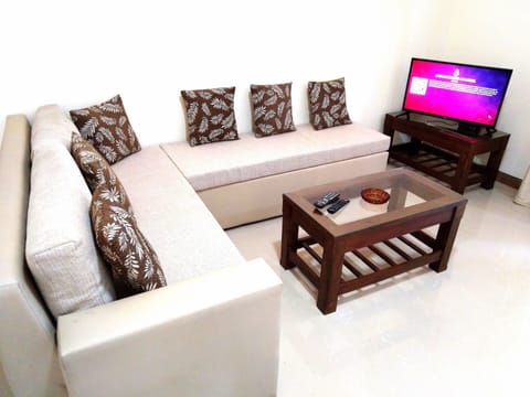 Family Apartment, 1 Bedroom, Smoking | Living area | LCD TV, fireplace, DVD player