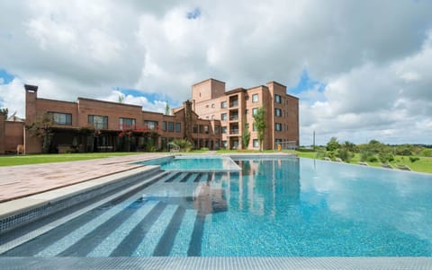 Indoor pool, outdoor pool, pool umbrellas