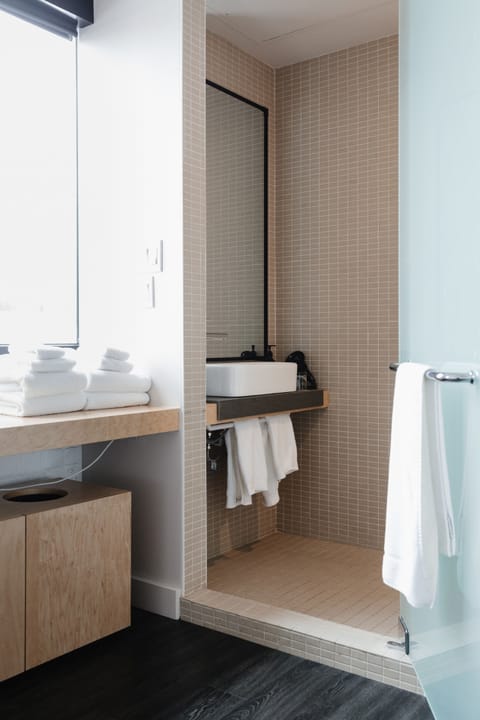 Design Double Room, 2 Queen Beds | Bathroom | Shower, rainfall showerhead, designer toiletries, hair dryer