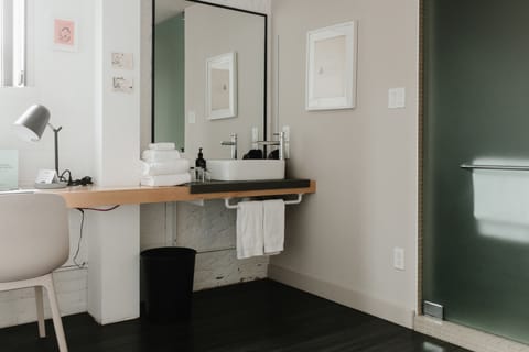 Design Studio, 1 Queen Bed | Bathroom | Shower, rainfall showerhead, designer toiletries, hair dryer