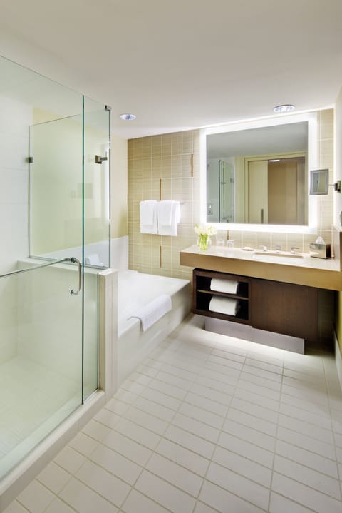 Separate tub and shower, deep soaking tub, designer toiletries