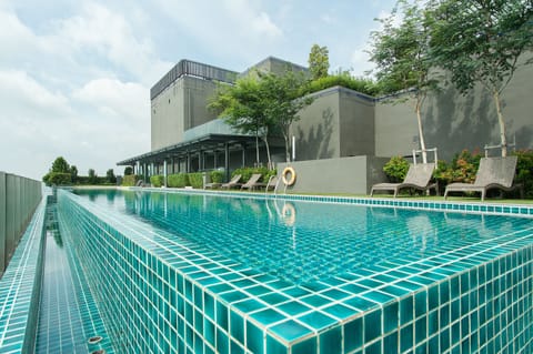 Outdoor pool, a rooftop pool, sun loungers