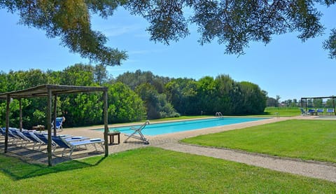 Bamboo shades at both ends of the pool