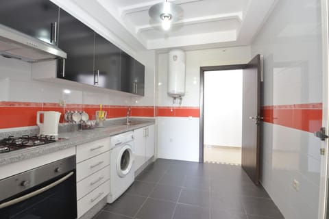 Comfort Apartment (2) | Private kitchen | Fridge, microwave, oven, stovetop