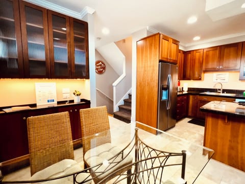 Gourmet kitchen with high-end appliances, spacious layout, and dining island!