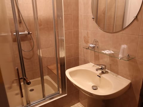 Shower, free toiletries, hair dryer, towels